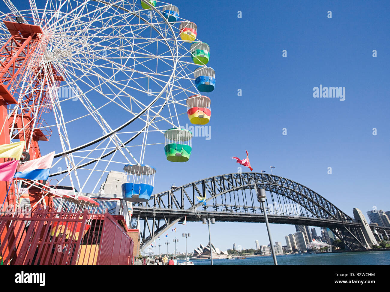 Une grande roue et Sydney Harbour Bridge Banque D'Images