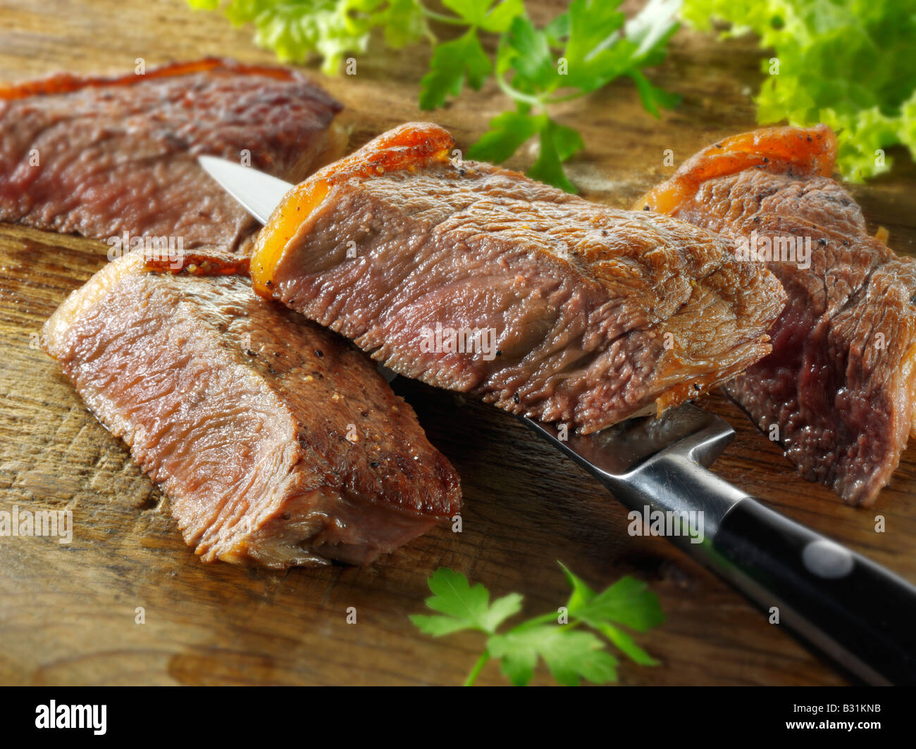 Steak de faux filet de boeuf - bien fait Banque D'Images