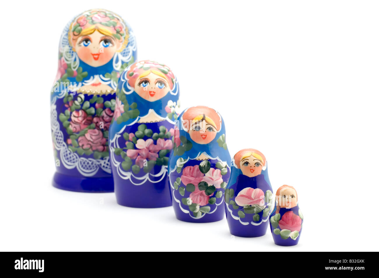 Sur un objet souvenir national russe blanc poupée en bois Banque D'Images