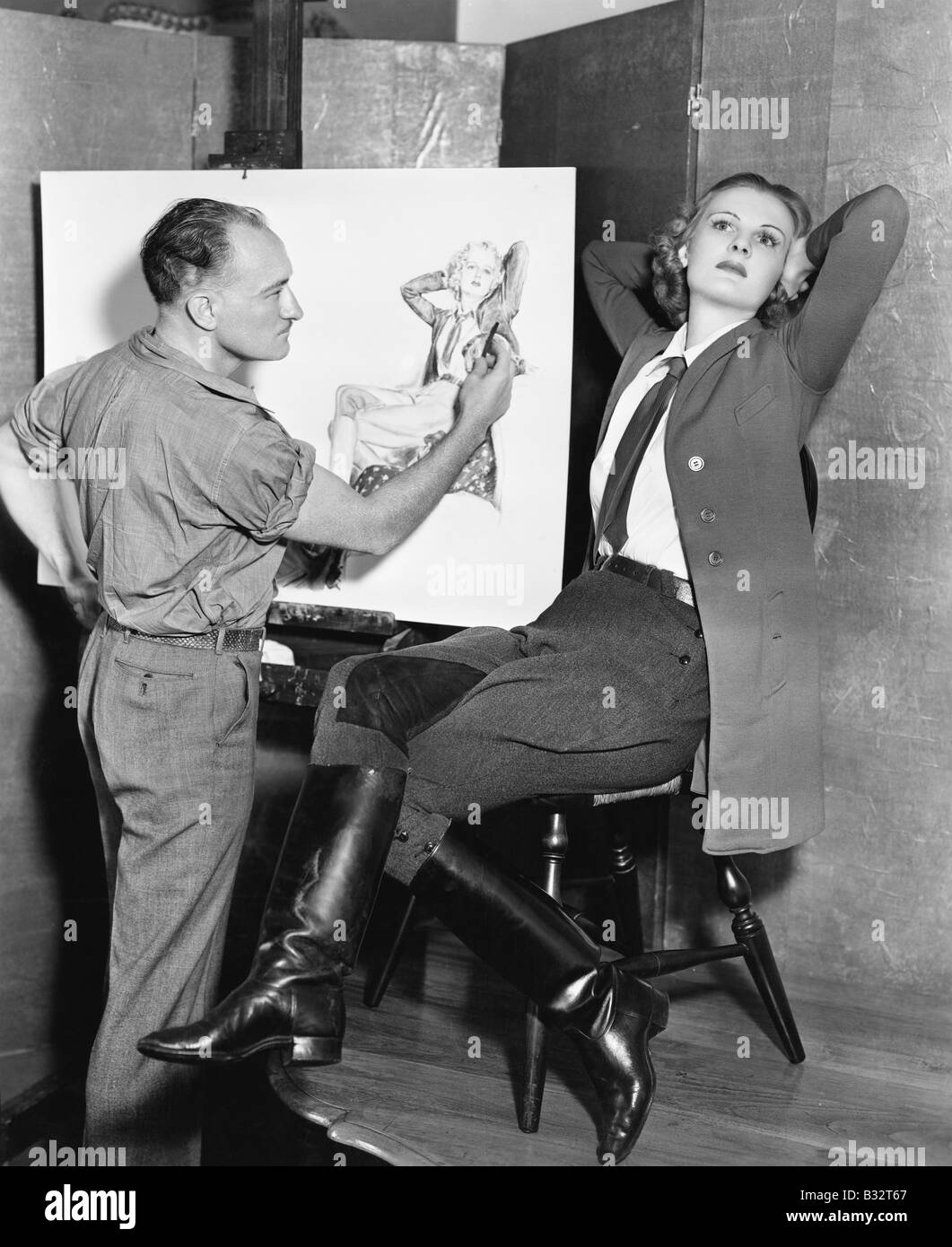 Profil d'un peintre dessinant un croquis d'une jeune femme Banque D'Images