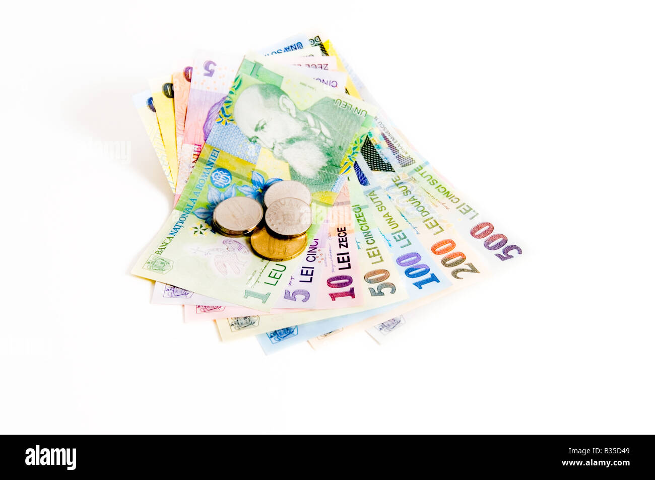 L'argent, Lei roumains, les billets de 1 Leu avec Nicolae Iorga et petit changement sur fond blanc Banque D'Images