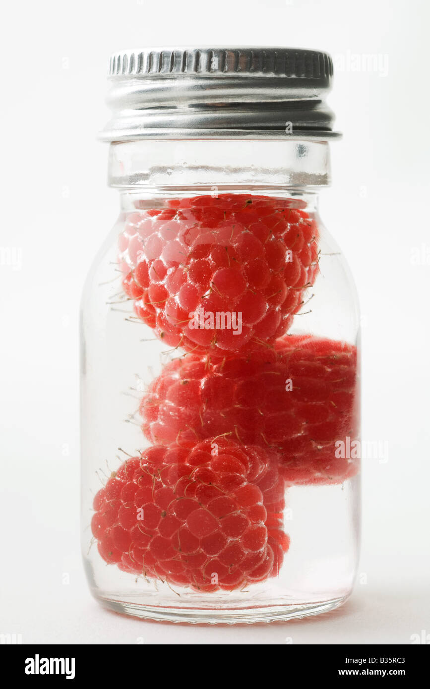 Framboises au petit pot, close-up Banque D'Images