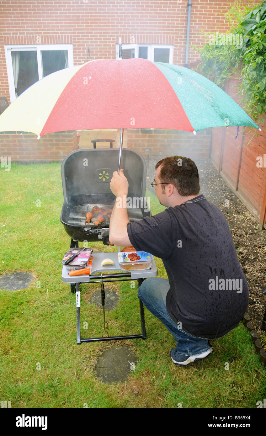Umbrella barbecue Banque de photographies et d'images à haute résolution -  Alamy