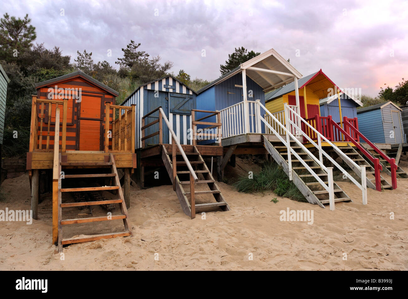 Cabines de plage au coucher du soleil, Wells-Next-the-Sea, Norfolk Banque D'Images
