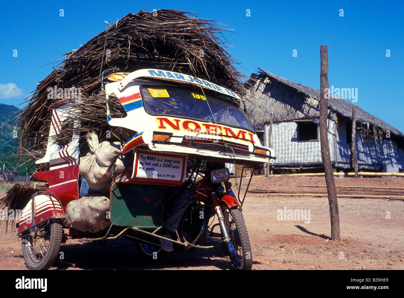 En tricycle honda bay PALAWAN PHILIPPINES Banque D'Images