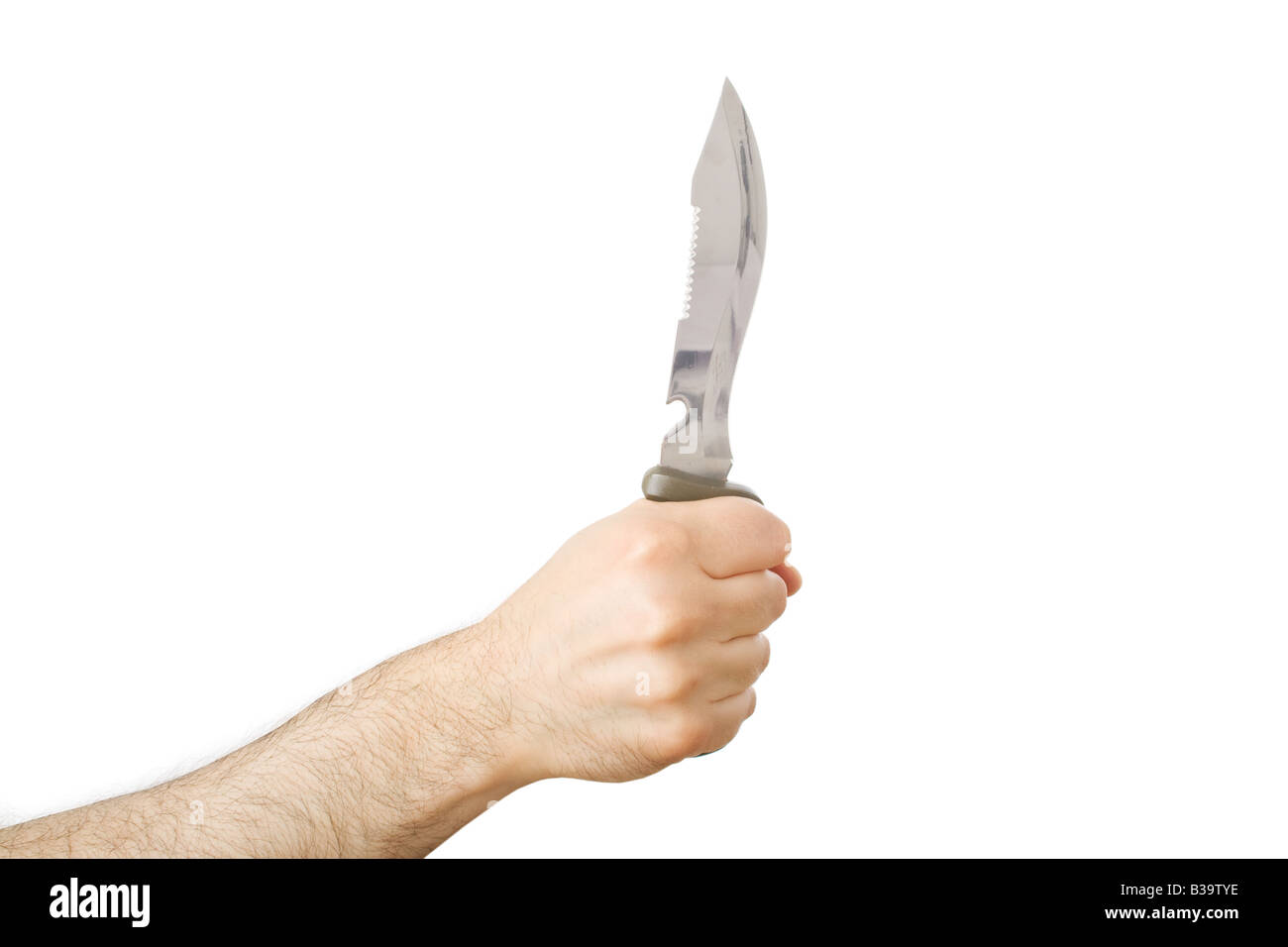 Main tenant un couteau de chasse, dans un geste de couteau Banque D'Images