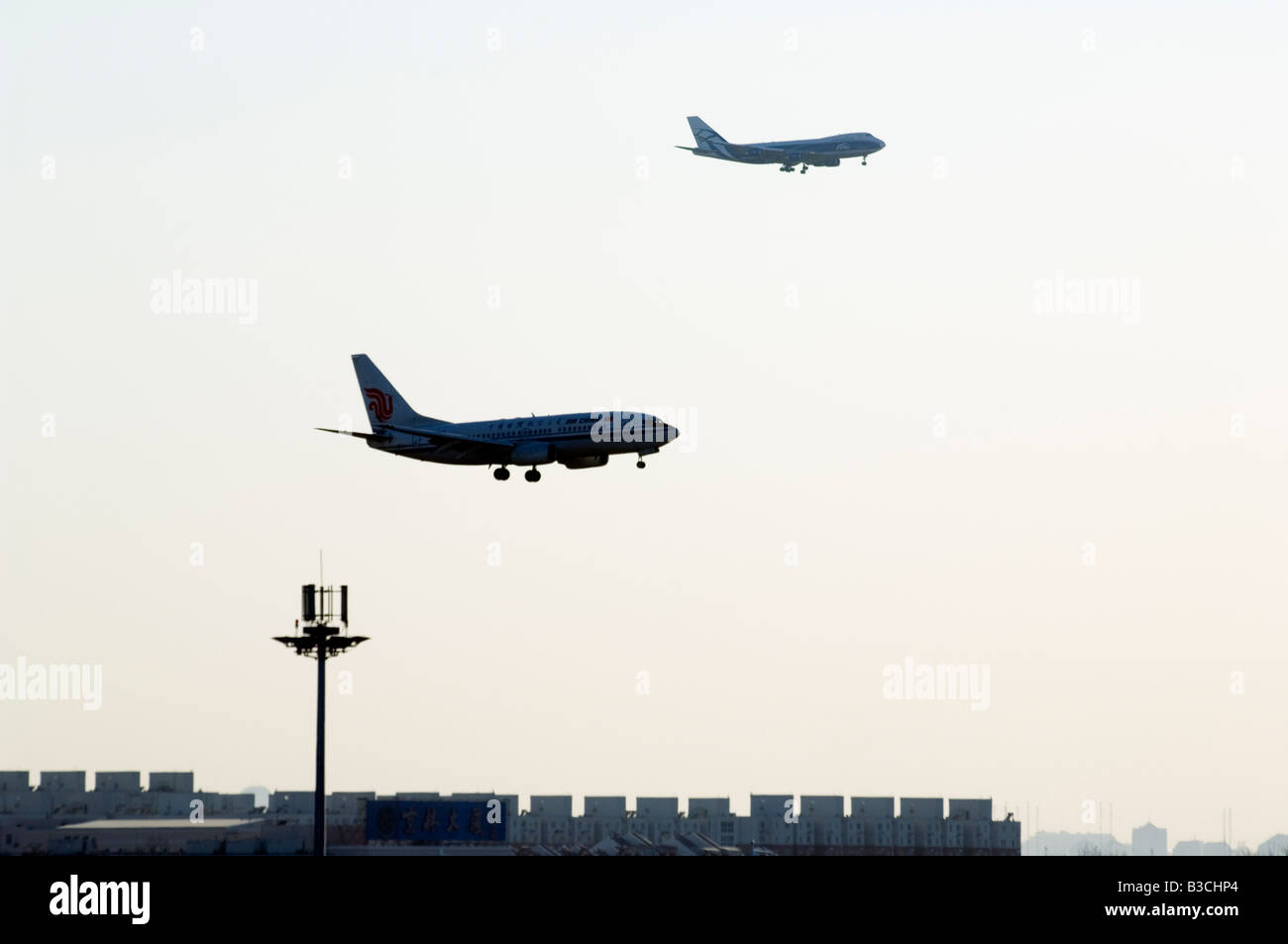 La Chine, Beijing, Beijing Capital Airport. Les avions arrivant sur la terre à la borne 3 du nouveau bâtiment inauguré Février 2008 Banque D'Images