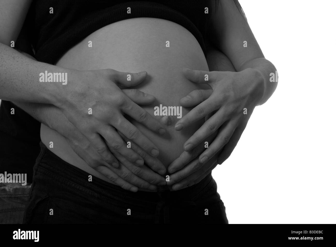 Enceinte de 8 mois mi années '20 femme de 25 ans avec l'homme de 25 ans partner Banque D'Images