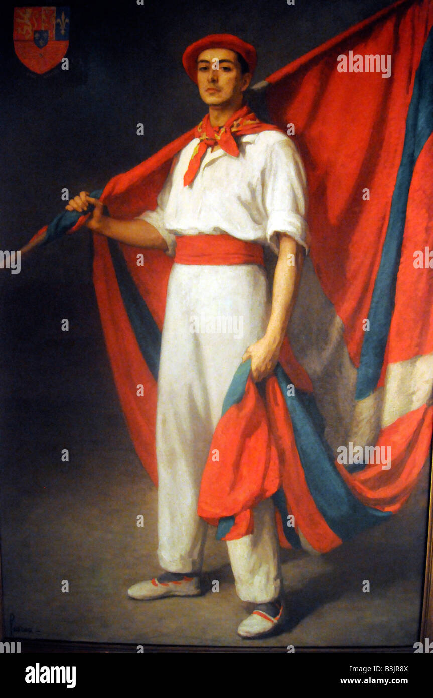 Portrait d'un indépendantiste basque vêtus de façon traditionnelle et portant le drapeau Basque ; peinture à Bayonne, France Banque D'Images
