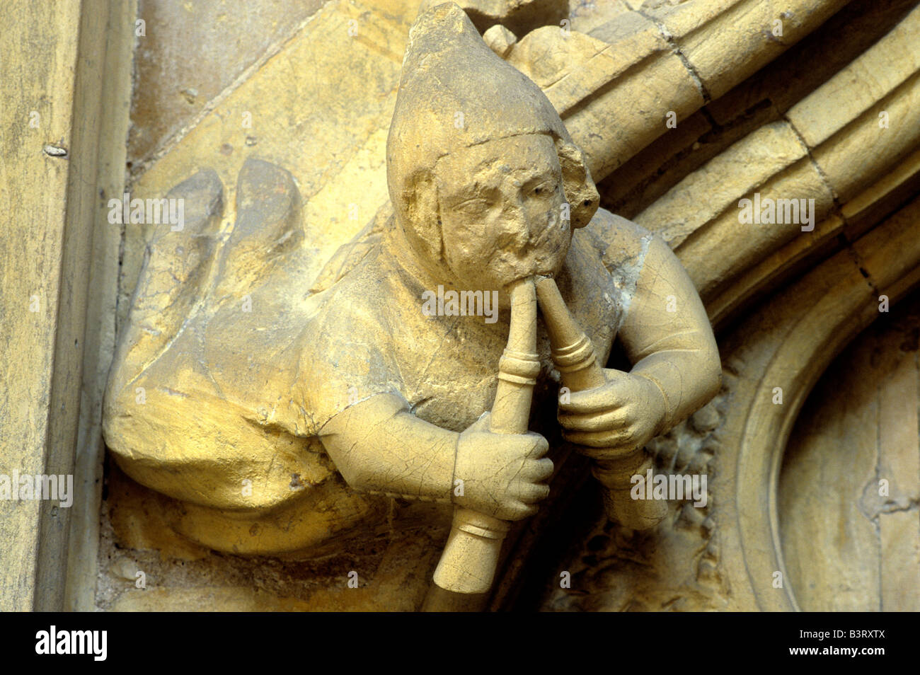 Tuyaux musicien médiéval Beverley Minster sculpture sur pierre d'instruments de musique musique musiciens instruments figure sculptée Yorkshire Banque D'Images