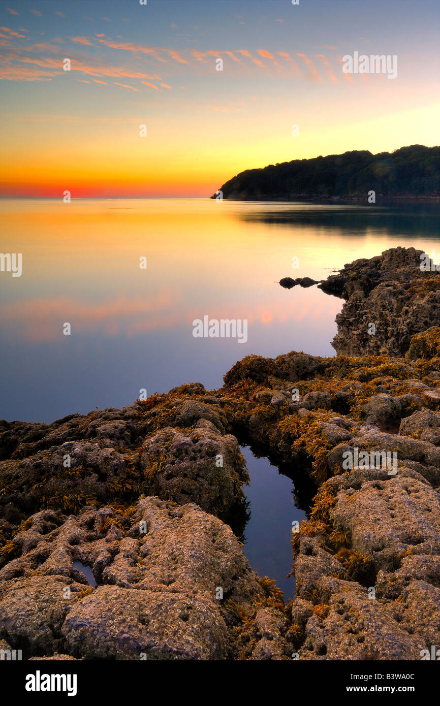L'estran rocheux de Elberry Cove près de Paignton Devon Broadsands Sud au lever du soleil Banque D'Images
