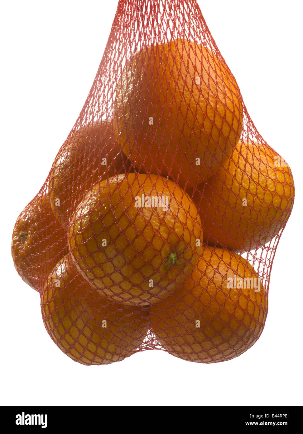 Oranges en sac de chaîne Banque D'Images