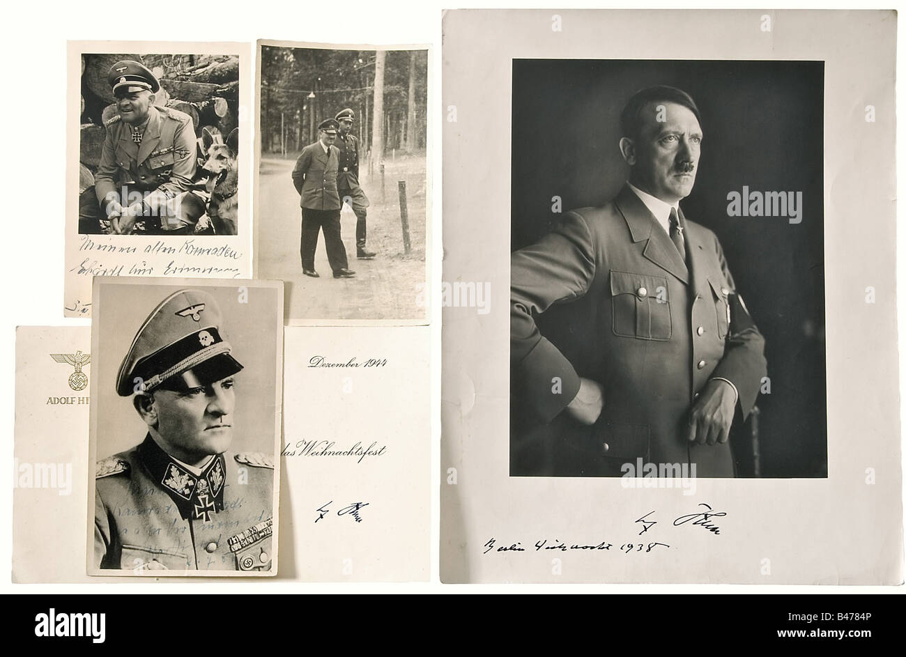 SS-Obersturmführer Walter Erhardt., Autographes, photographies et documents de sa période de service avec la LSSAH. Deux autographes d'Adolf Hitler: 'Adolf Hitler - Berlin Weihnachten 1938' (Adolf Hitler - Berlin Christmas 1938), sur le passage d'une photo grand format portrait en uniforme de fête, estampillé 'Nachdruck jeder Art verboten! Allehersteller H. Hoffmann München, Amalienstr. 25.' (toute forme de reproduction est interdite! Seul producteur H. Hoffmann Munich, Amalienstr. 25). 27,5 x 22 cm. Signature, 'Adolf Hitler' sur une carte imprimée 'Herzliche Glückwünsche, Banque D'Images