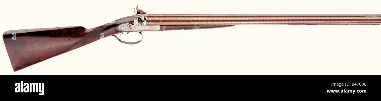 Un fusil de chasse à double barré, James Purdey, Londres, Californie. 1860. Fûts de damas dorés de calibre 17 mm (un museau légèrement denté). Les plaques de verrouillage finement gravées avec des faisans et des chiens et signèrent 'Purdey'. Le marteau gauche est fortement poli, probablement après une réparation. Demi-stock de noyer avec mobilier en fer et escutcheon argent. Tige en bois. Les surfaces métalliques et la finition refaite, les gravures polies par endroits. Longueur 106 cm. James Purdey (1828 - 1909) Londres. En 1843, il a fait son apprentissage à son père, puis il a repris l'entreprise, Purdey & Sons après 1879. Erw, Banque D'Images