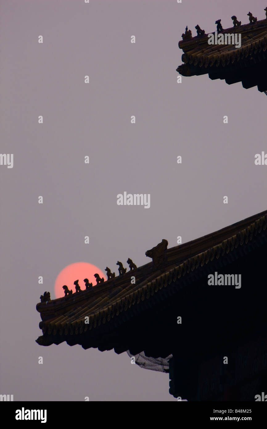 Chine Pékin Cité Interdite Chiffres toit coucher du soleil Banque D'Images