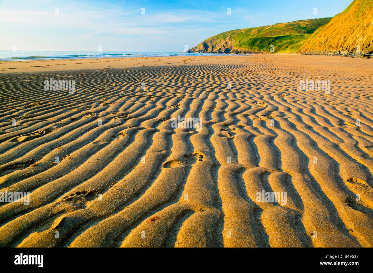 Des traces de pas dans le sable Penbryn Ceredigion Pays de Galles Banque D'Images