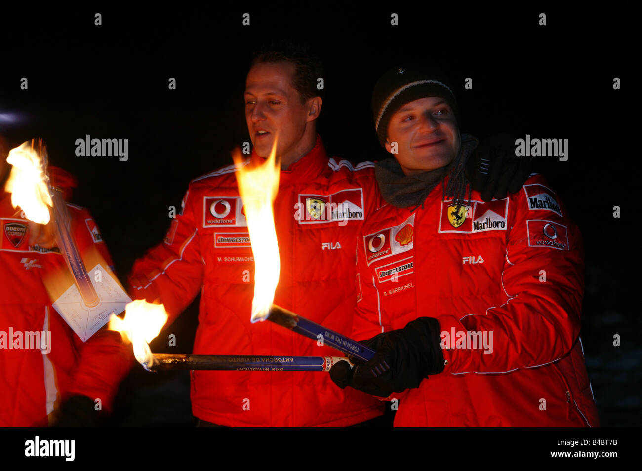 Sport moteur, Michael Schumacher et Rubens Barrichello, avec des torches, en soirée, la nuit, 1 personnes,, race driver, Banque D'Images