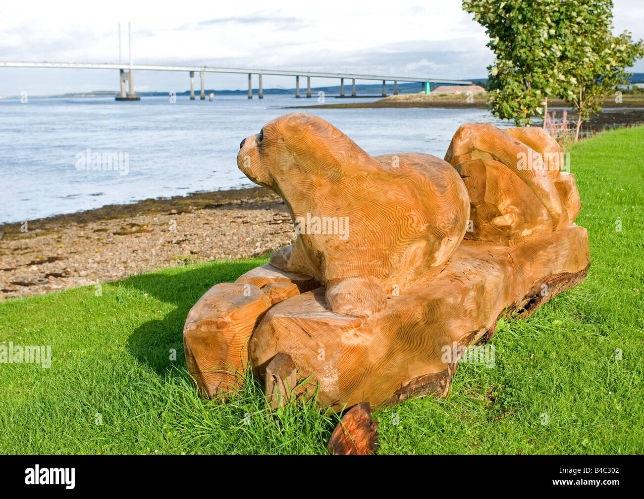Scie à chaîne en bois Sculpture de Phoque commun à Merkinch Inverness. Banque D'Images
