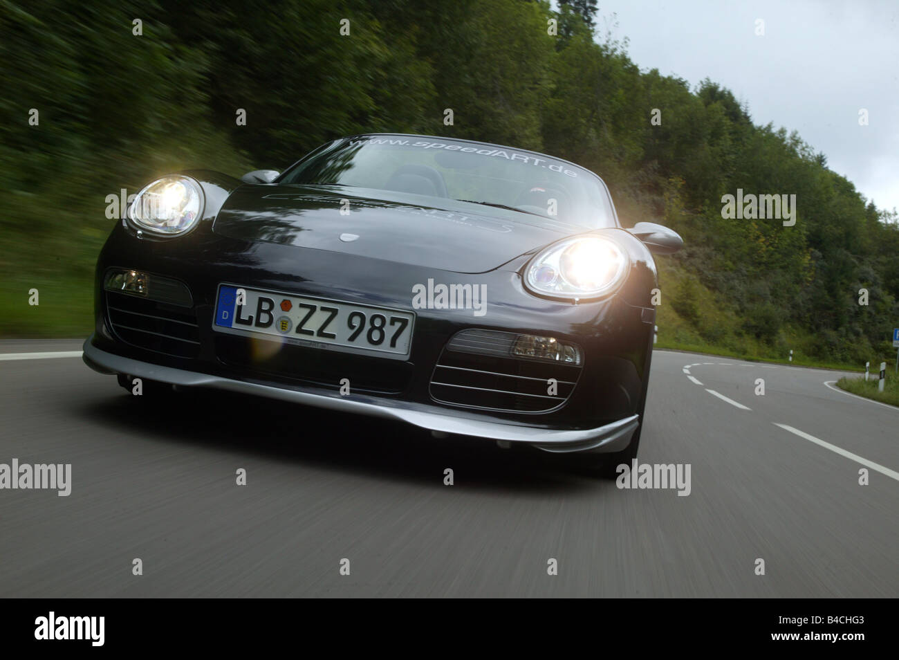 Speedart Porsche Boxster, année modèle 2005, noir/argent, open top, la conduite, la diagonale de l'avant, vue frontale, test track, T Banque D'Images