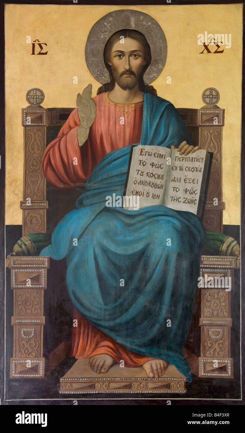 Jésus holding book'' Je suis la Lumière du Monde'' illustration ancienne église des sentiers à Tissiniva Crete island Grèce Banque D'Images