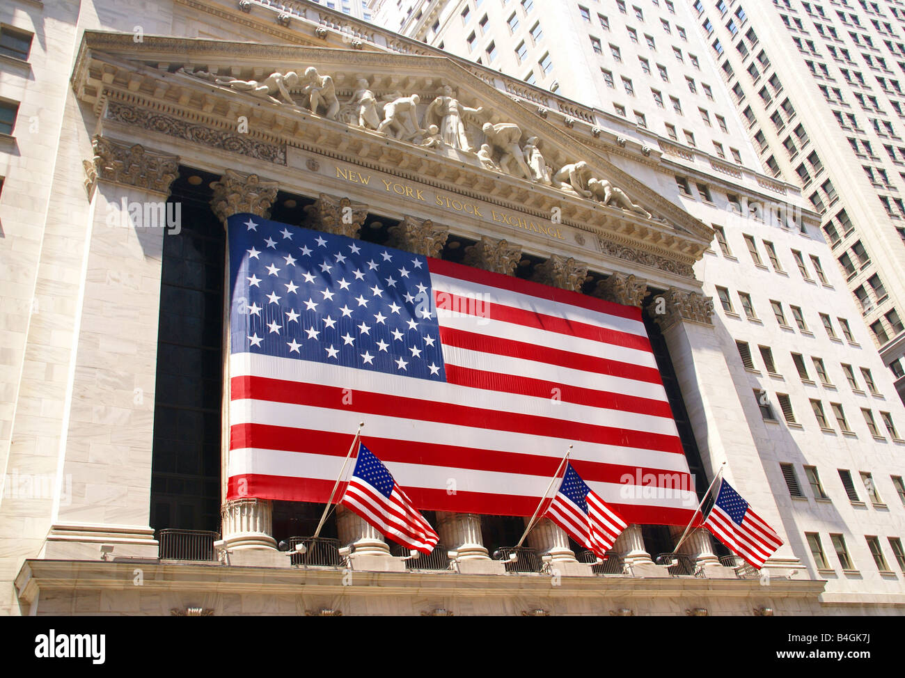 New York Stock Exchange drapé de drapeaux américains quartier financier de Wall Street, New York City Banque D'Images