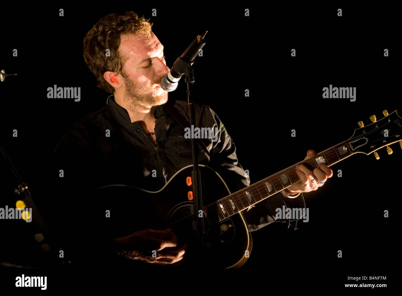 Chris Martin sur scène avec Coldplay au Sydney Entertainment Centre, Australie Banque D'Images