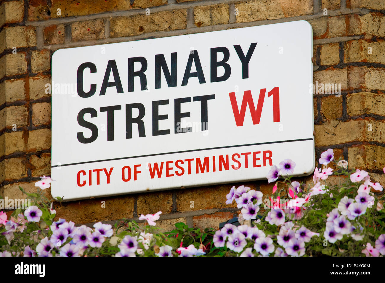 Plaque de rue sur Carnaby Street London England UK Banque D'Images