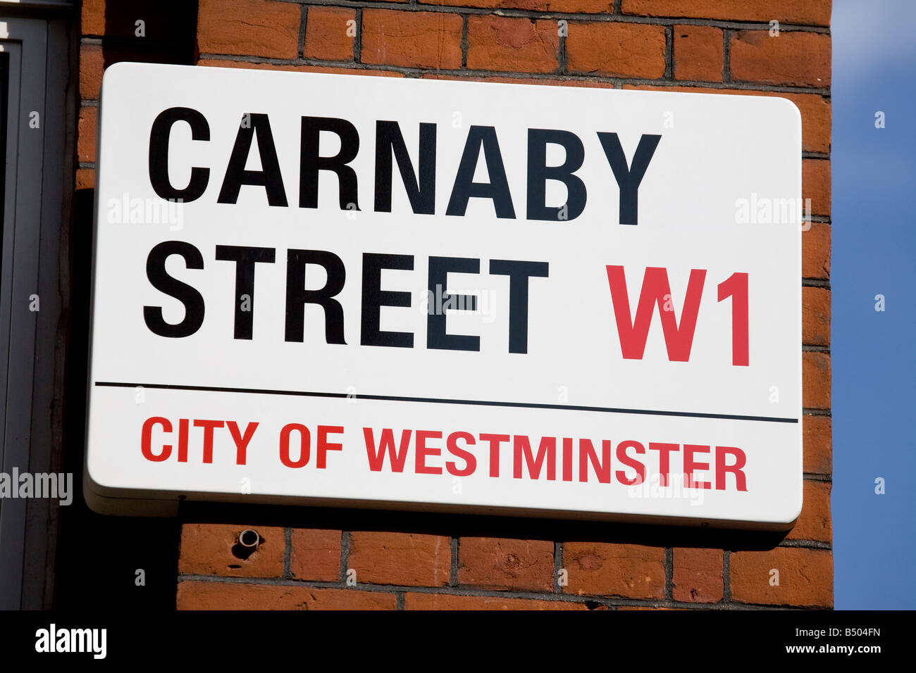 Plaque de rue sur Carnaby Street London England UK Banque D'Images