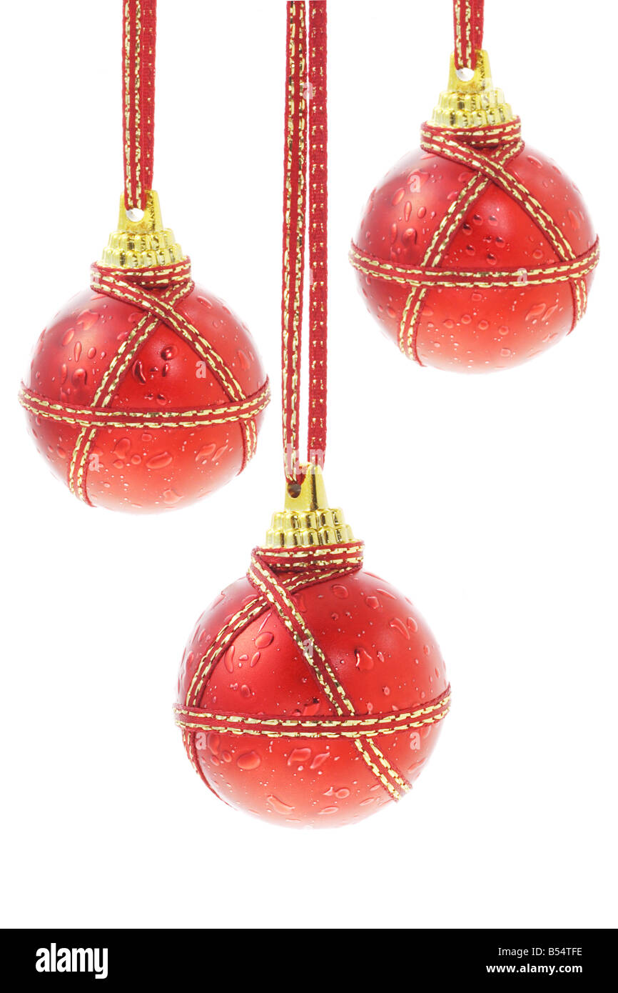 Trois boules de Noël rouge sur fond blanc Banque D'Images