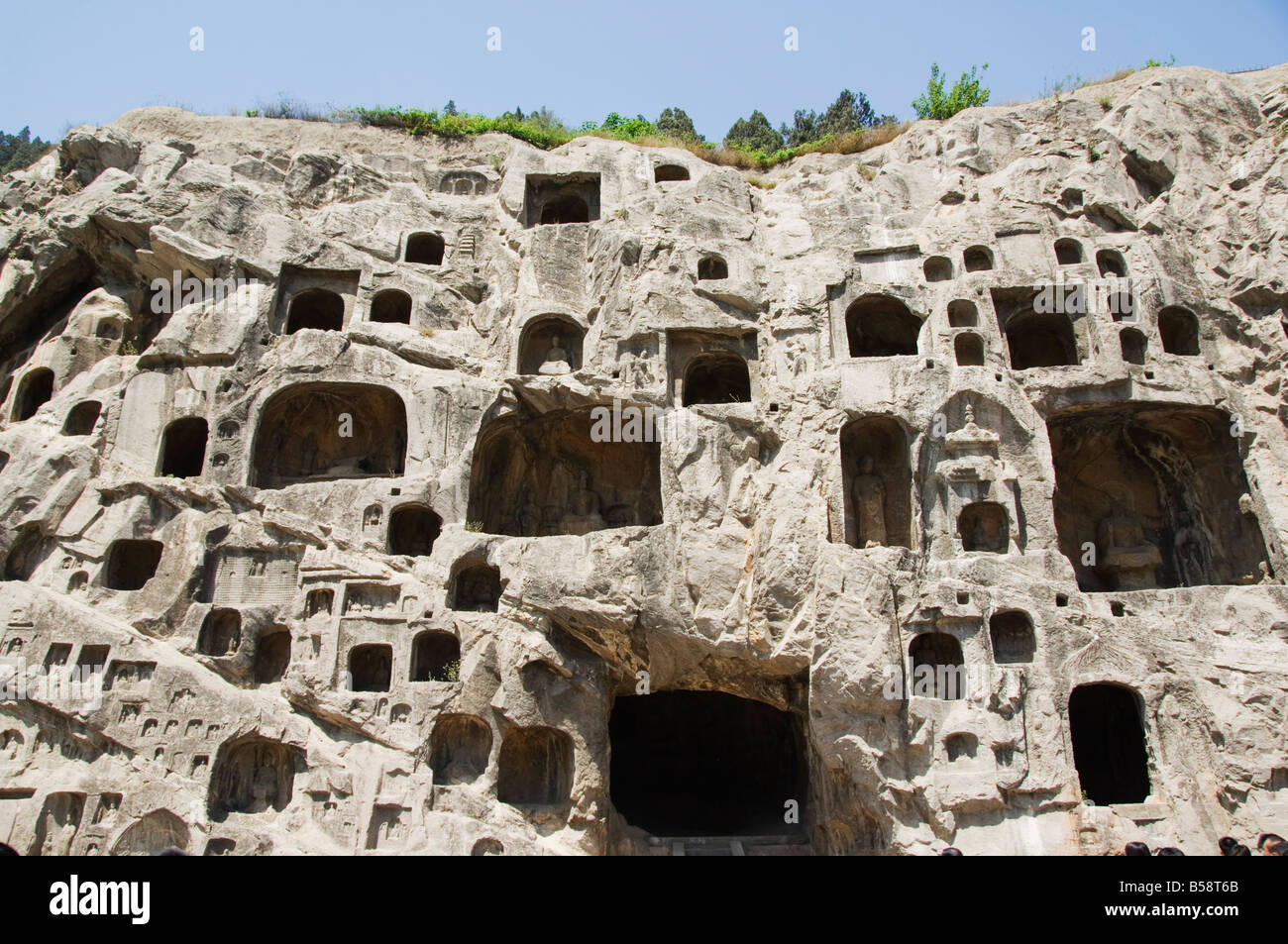 Les images de Bouddha sculptée à Grottes de Longmen, Dragon Gate Grottes, datant du 6e au 8e siècles, la province du Henan, Chine Banque D'Images