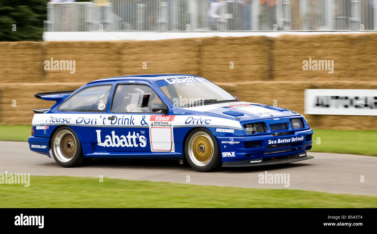 1990 Ford Sierra RS500 concurrent BTCC avec chauffeur Greg Rose à Goodwood Festival of Speed, Sussex, UK. Banque D'Images