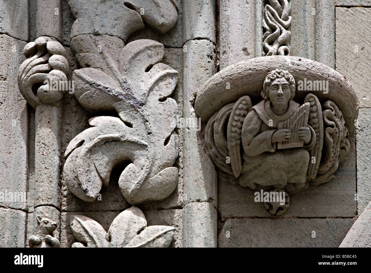 La figure sculptée holding instrument de musique sur le mur de Biblioteca Colombina library Las Palmas de Gran Canaria Espagne Banque D'Images