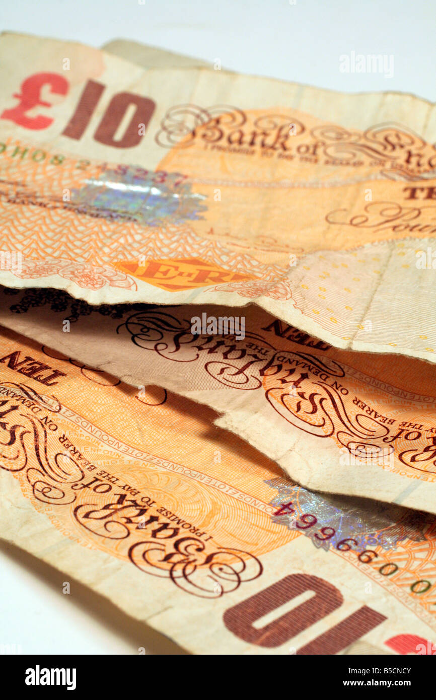 Vieille de dix livres note encore en circulation d'effilochement déchiré et sale sur les bords Banque D'Images
