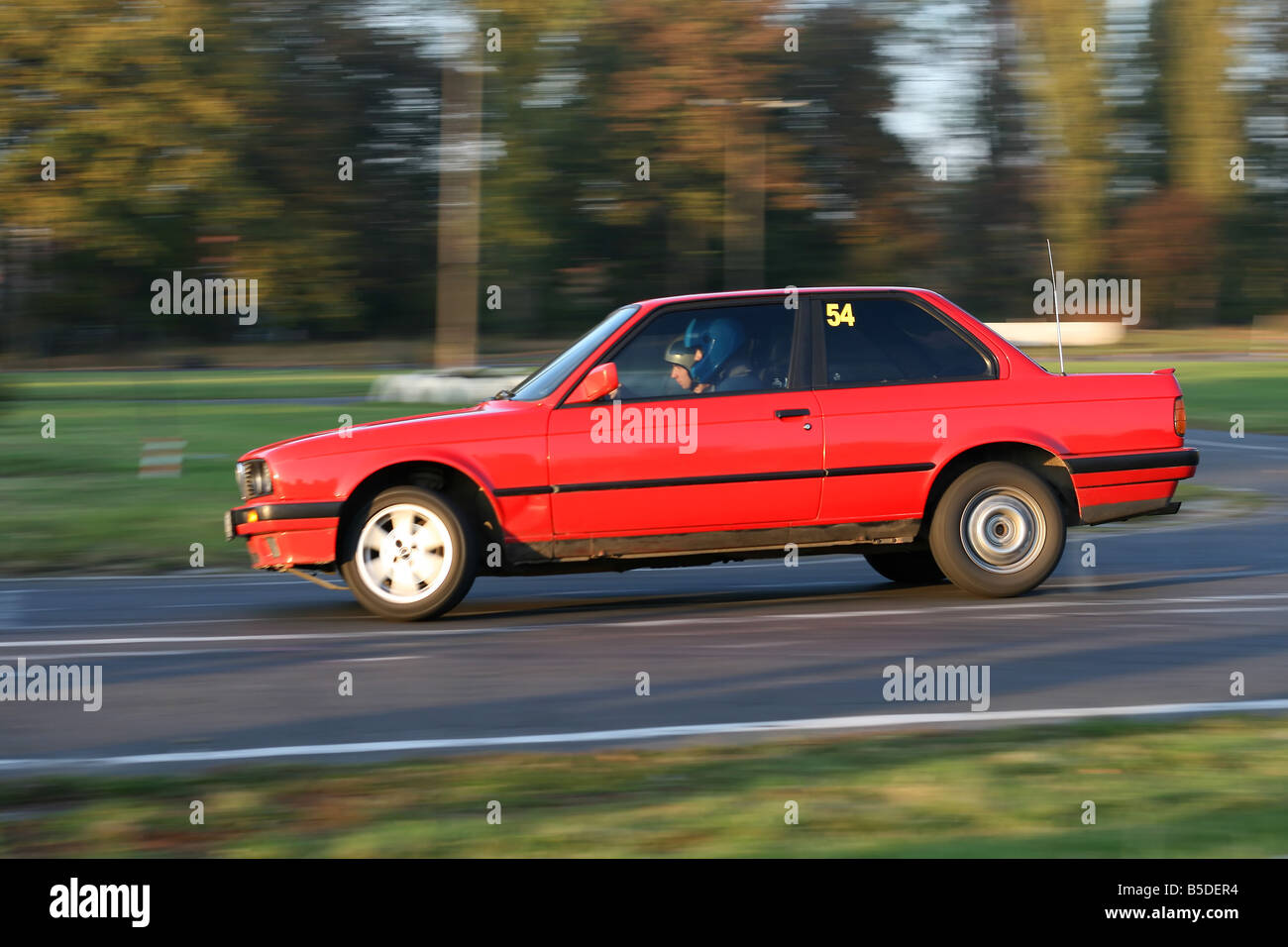 Voiture rallye coin fast motion blur powerslide Banque D'Images