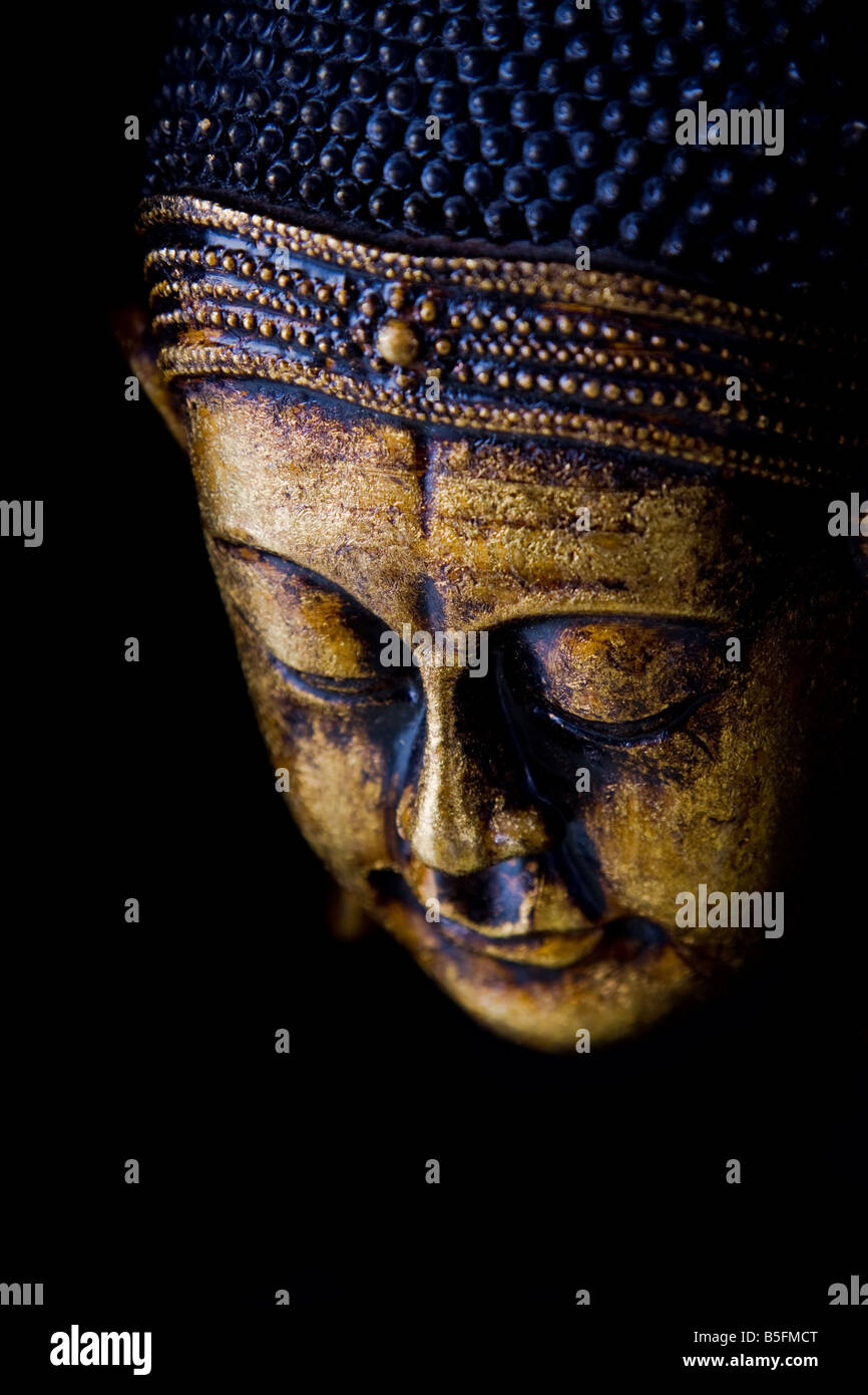 Statue de Bouddha en méditation l'accent sur les yeux qui s'arrête Banque D'Images