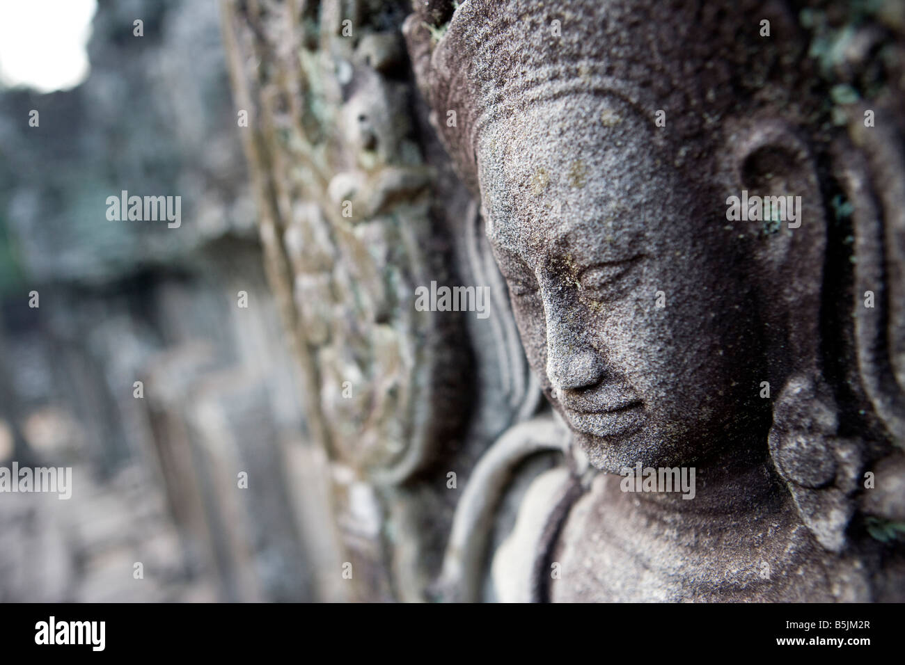 Détail de la sculpture ornée complexes sur les murs du Bayon temple Temples d'Angkor Wat, Siem Reap Cambodge Banque D'Images