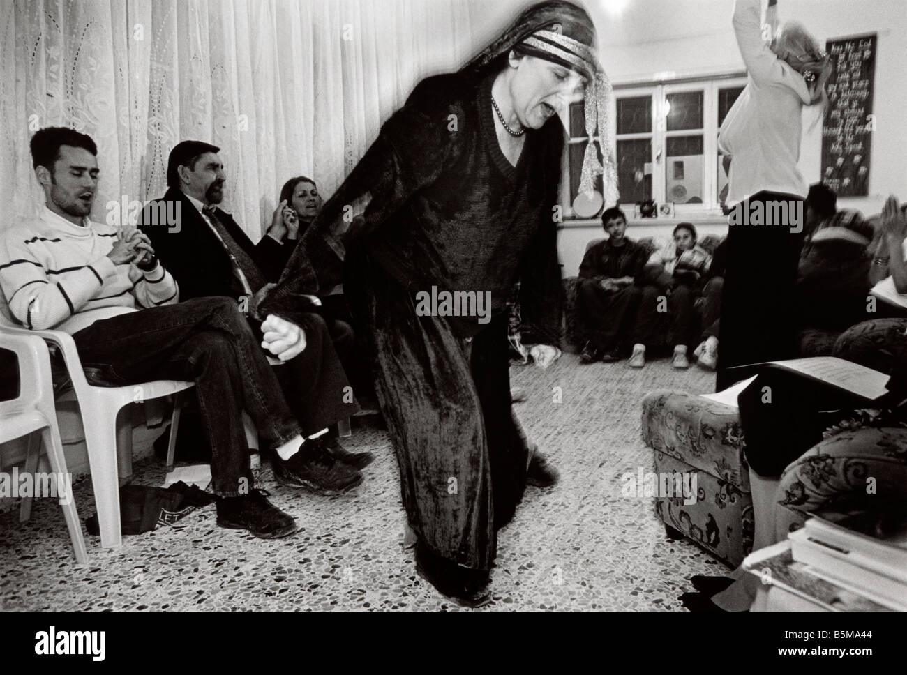 Les membres de la "Maison de Prière" un groupe de pèlerins chrétiens à une réunion de prière à Jérusalem, Israël Banque D'Images