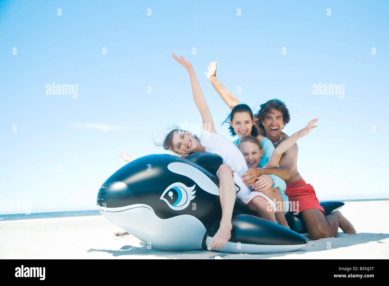 Happy family on beach Banque D'Images