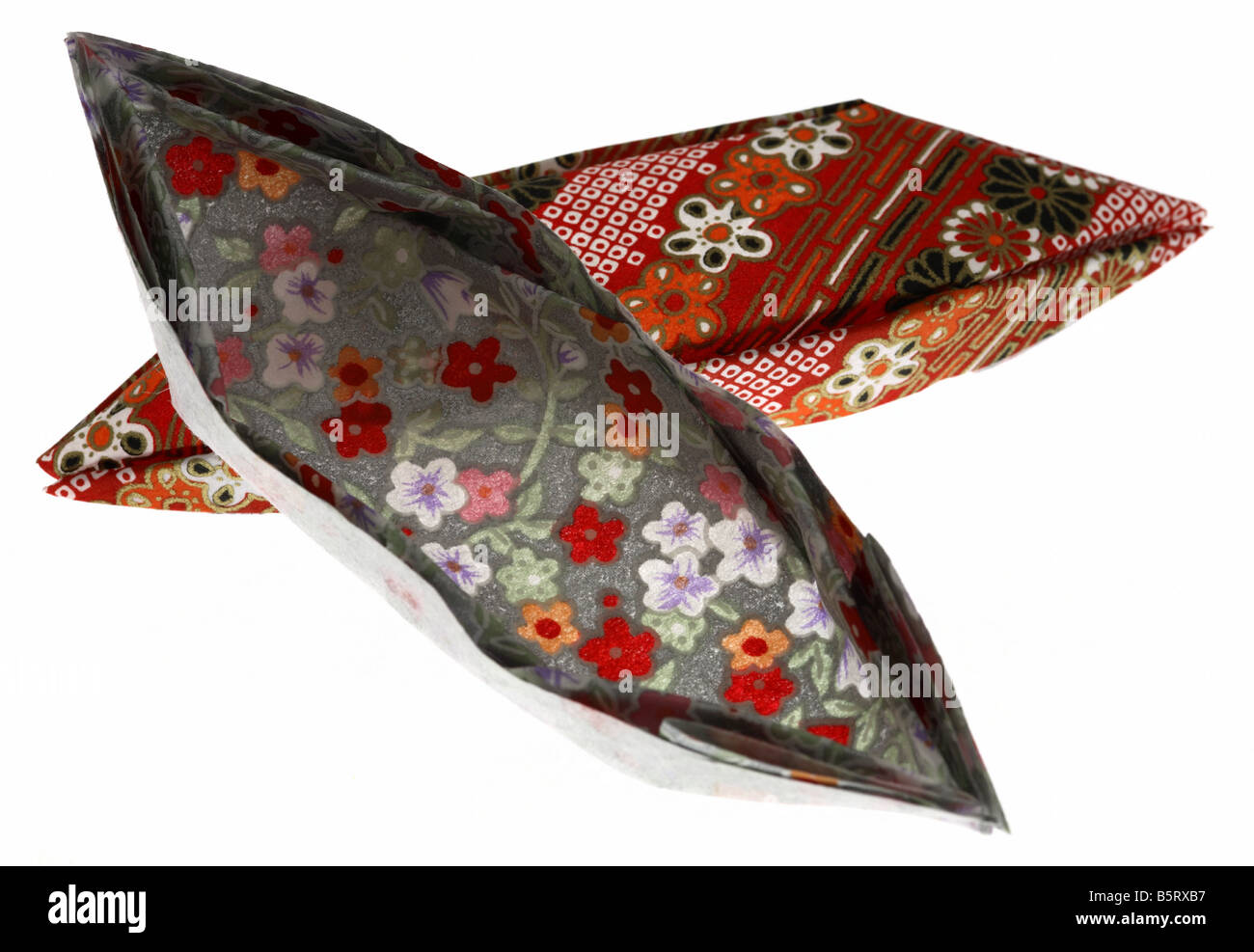 À l'intérieur et en bas de l'origami colorées des bateaux. Banque D'Images