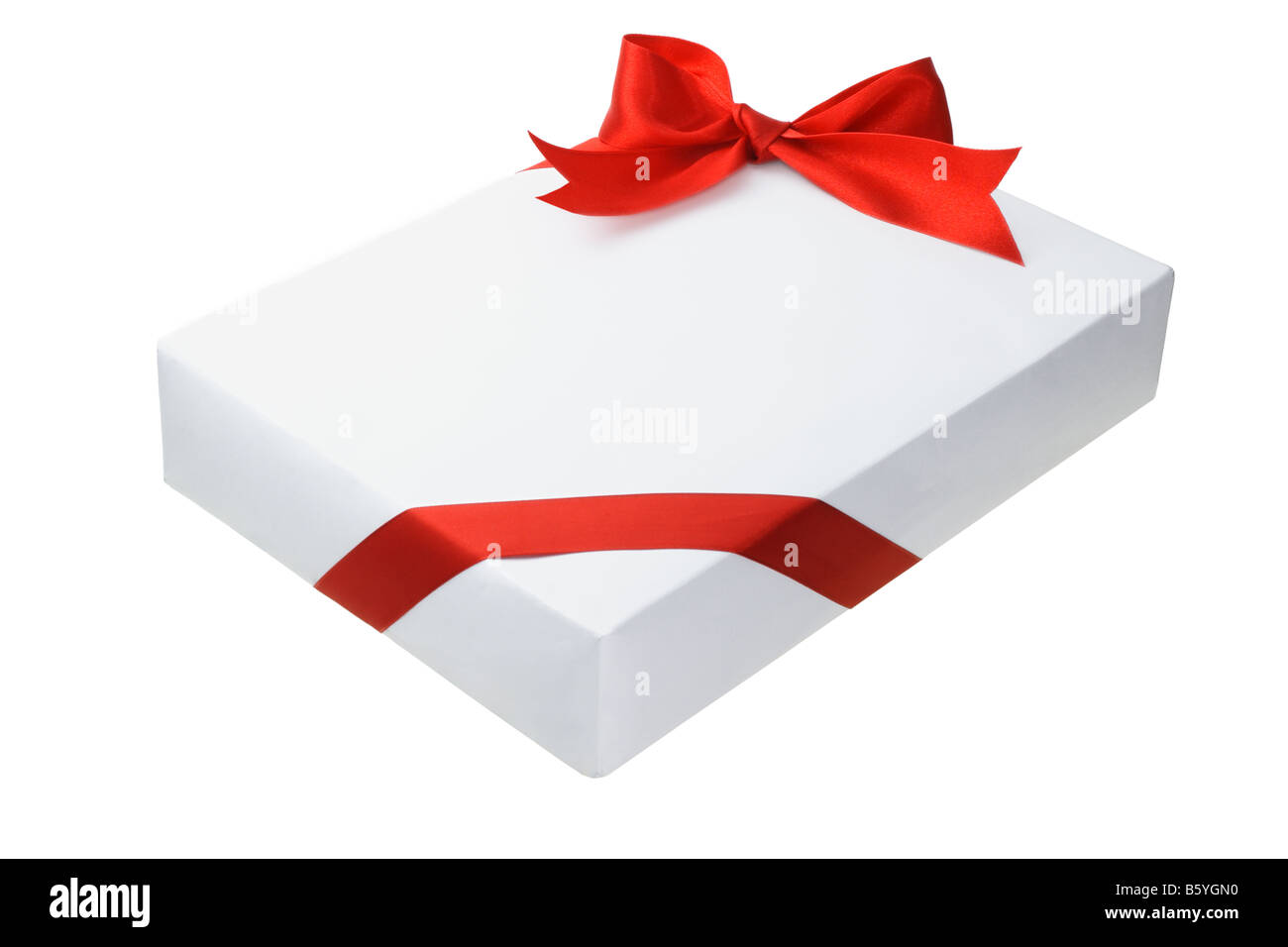 Forme rectangulaire boîte cadeau blanc orné de ruban arc rouge Banque D'Images