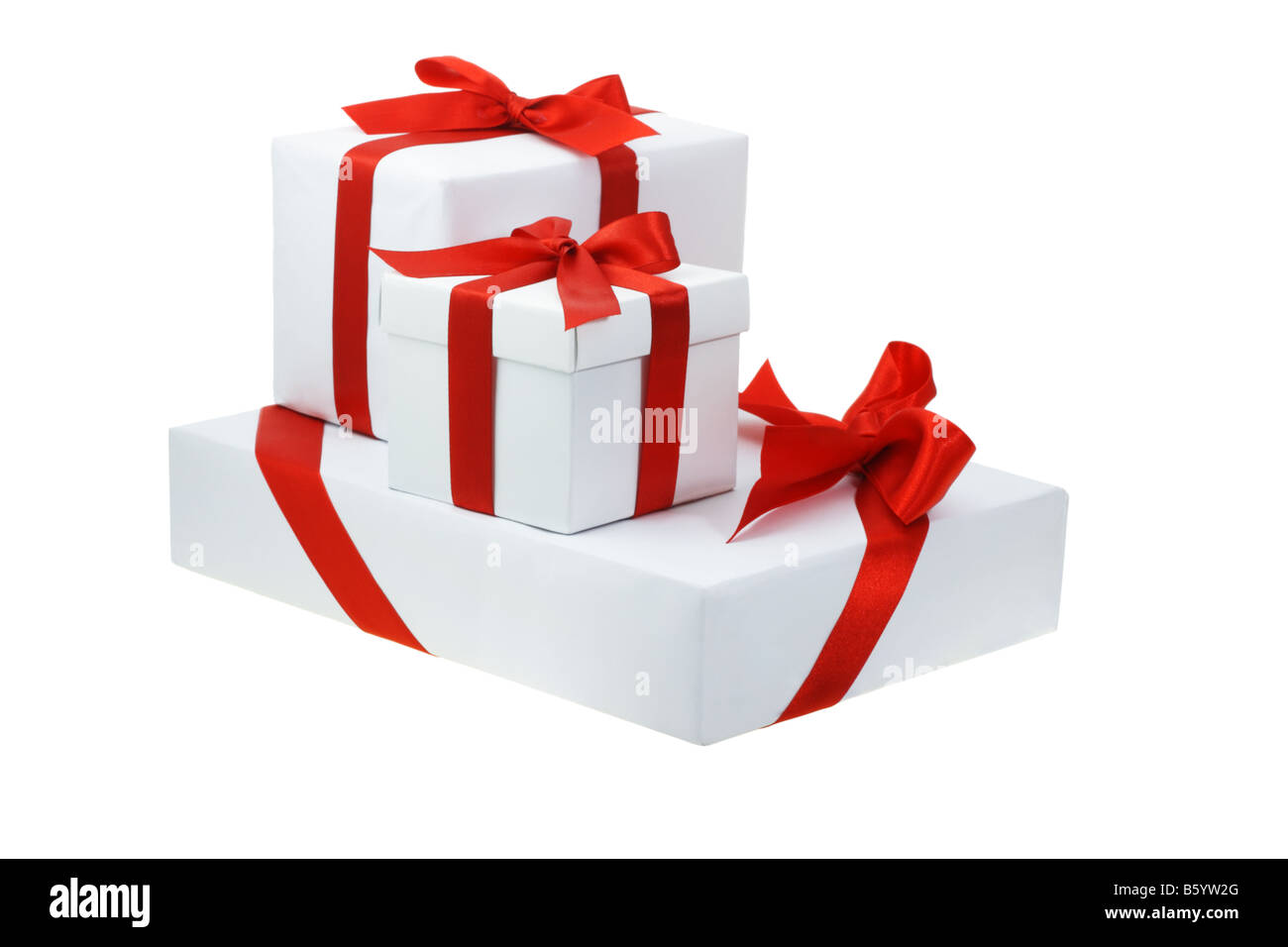 Trois cadeaux blanc avec rubans arc rouge Banque D'Images