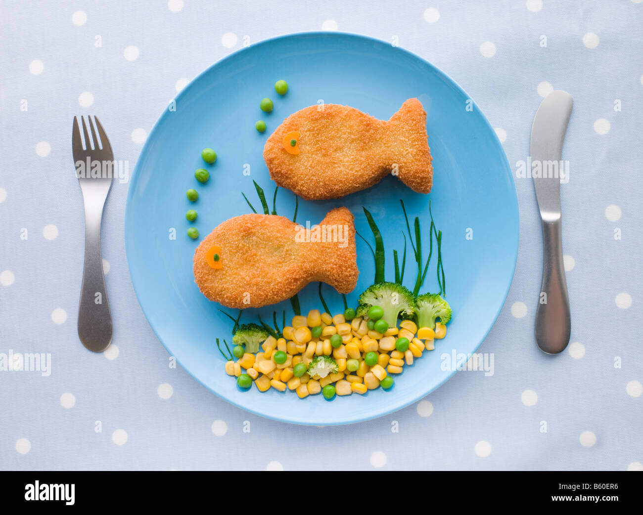 Croquettes de poisson avec légumes Banque D'Images