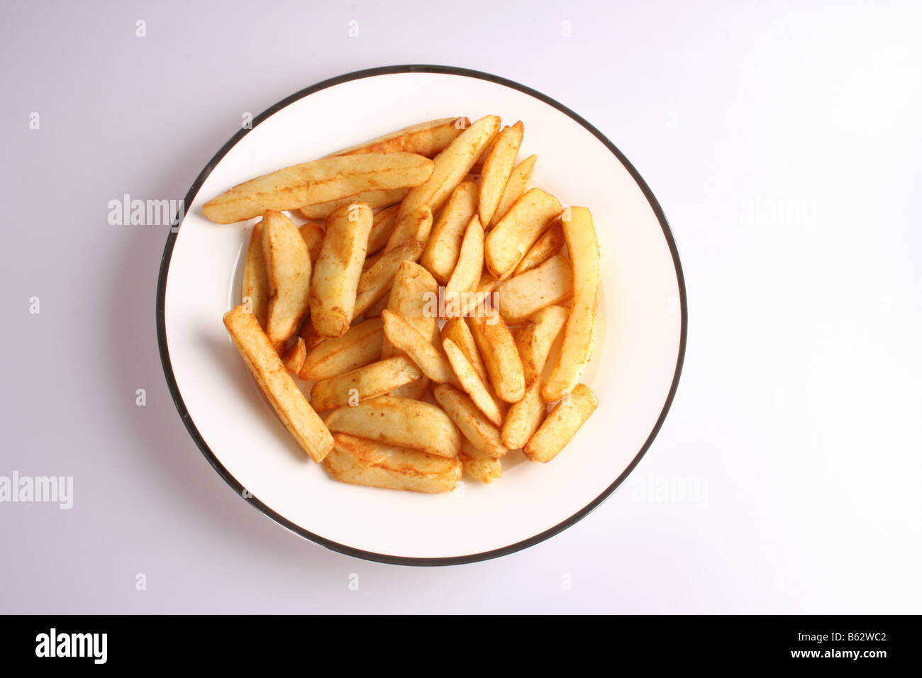 Une assiette de frites chunky Banque D'Images