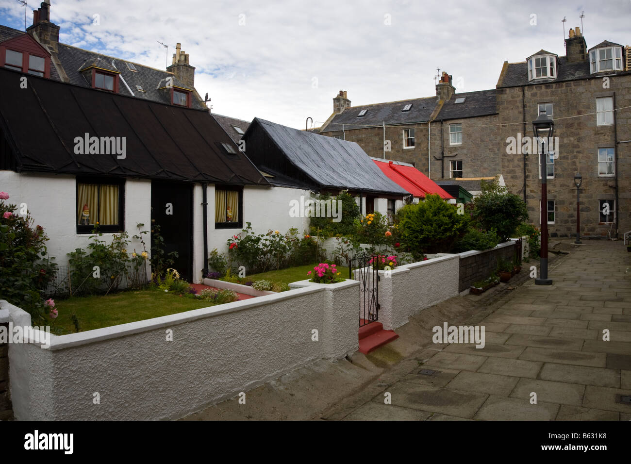 Maisons, jardins, maisons en Footdee Fittick ou Fittie, St, Aberdeen, Écosse, Royaume-Uni. Fittie carrés, un modèle de logement construit pour les pêcheurs en 1809. Banque D'Images