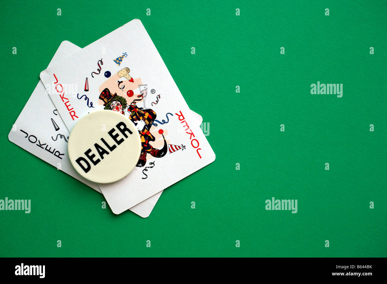 Les cartes joker et le concessionnaire au casino chip Banque D'Images