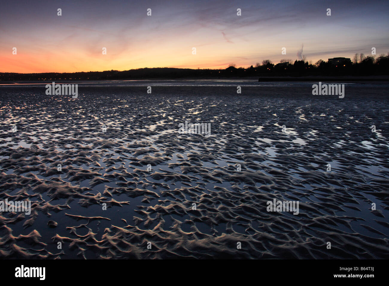 Blackpill Beach, la Baie de Swansea, au coucher du soleil, West Glamorgan, Pays de Galles, Royaume-Uni Banque D'Images