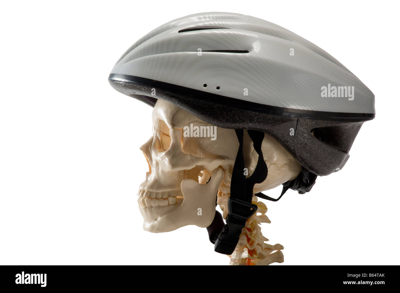 Crâne humain dans casque de vélo Banque D'Images