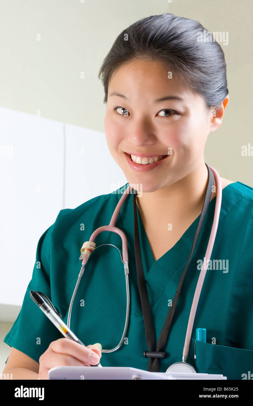 Portrait of a smiling nurse. Votre 'next', dit-elle. Banque D'Images
