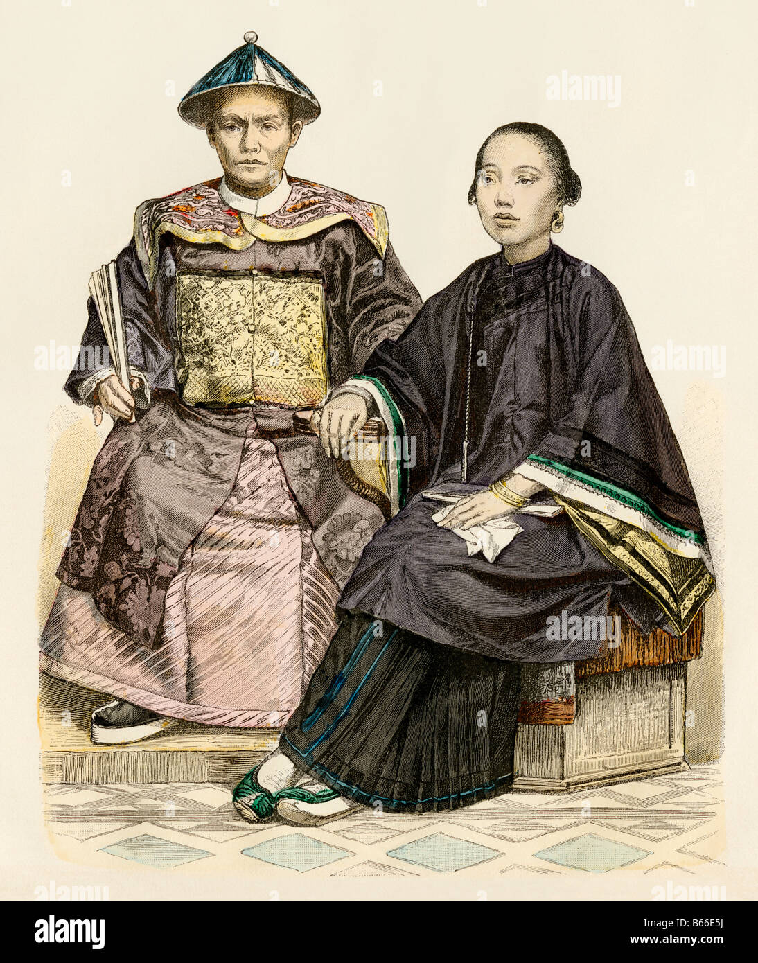 Homme d'affaires chinois et une Malaisienne en costumes traditionnels des années 1800. Impression couleur à la main Banque D'Images