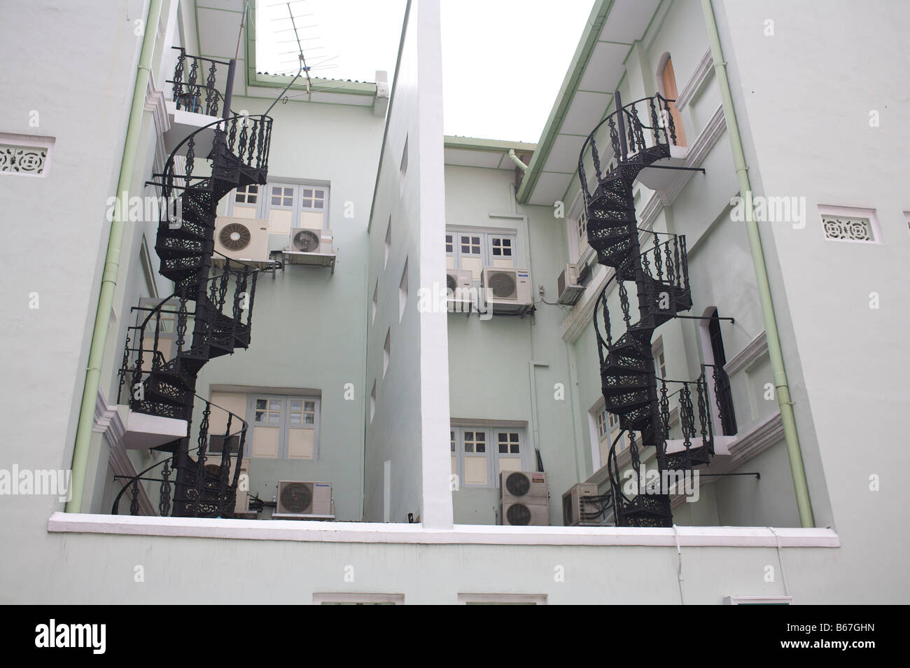 Escalier en colimaçon en fer vieux Singapour Banque D'Images